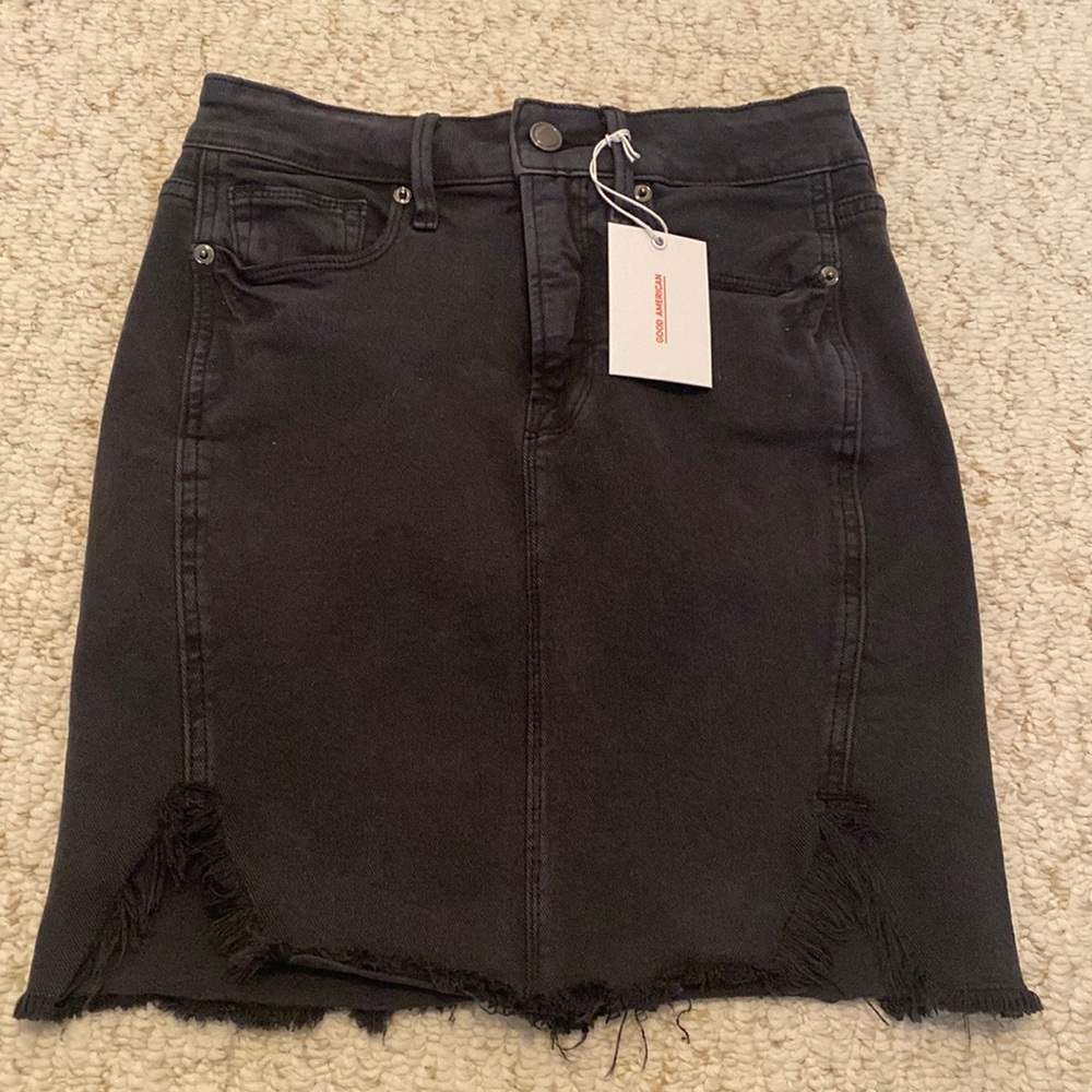 Good American distressed hem black denim mini skirt